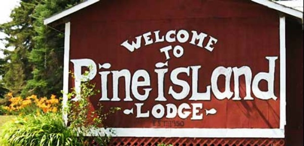 Welcome to Pine Island Lodge Sign